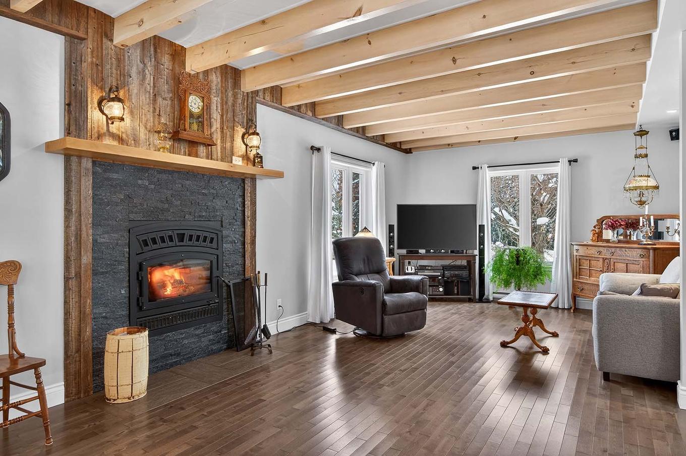 Living room - 221 Ch. Després, La Minerve, QC - Indoor Photo Showing Living Room With Fireplace