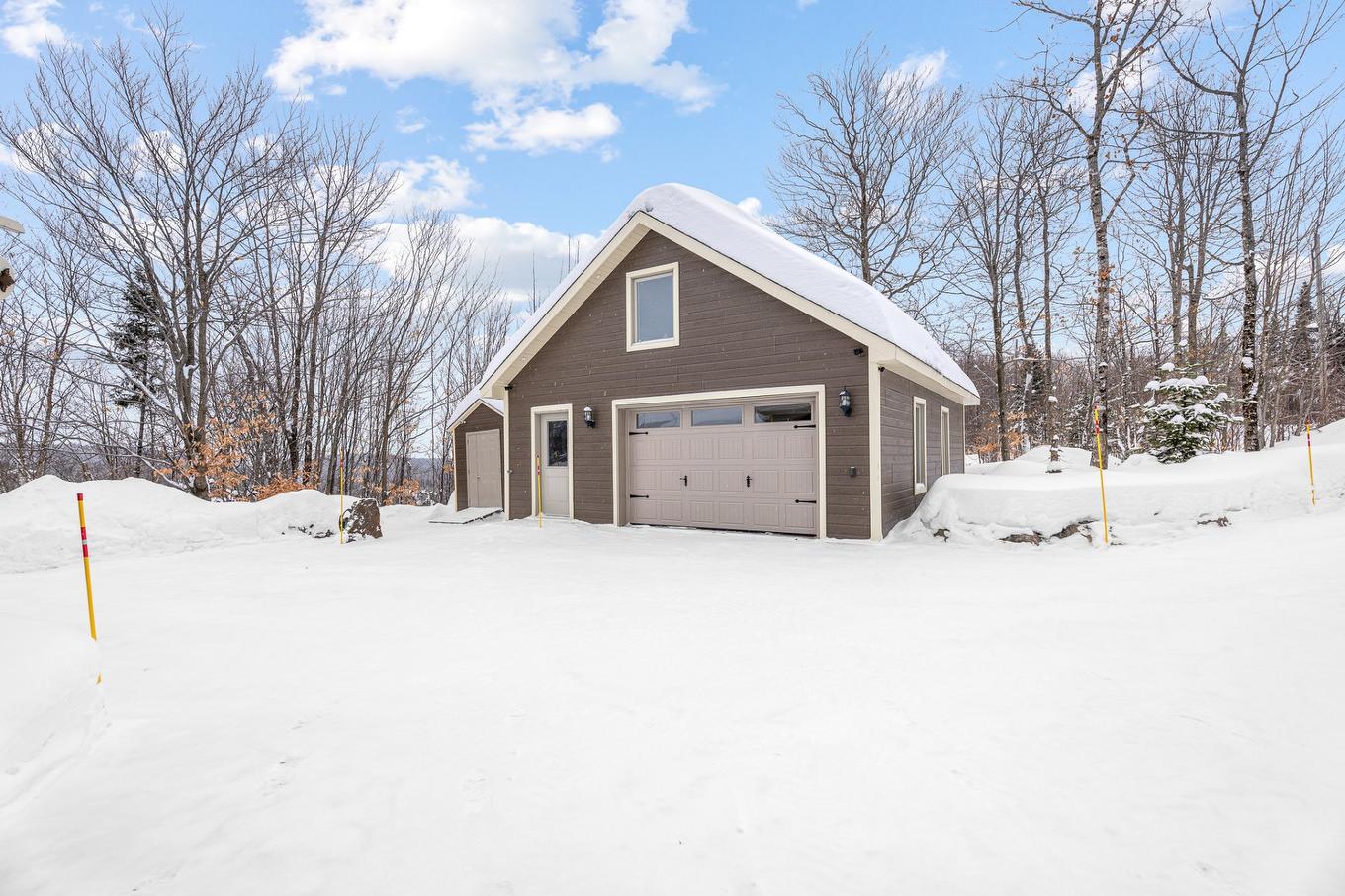 Garage - 22 Rue Des Gemmes, Sainte-Marguerite-Du-Lac-Masson, QC - Outdoor