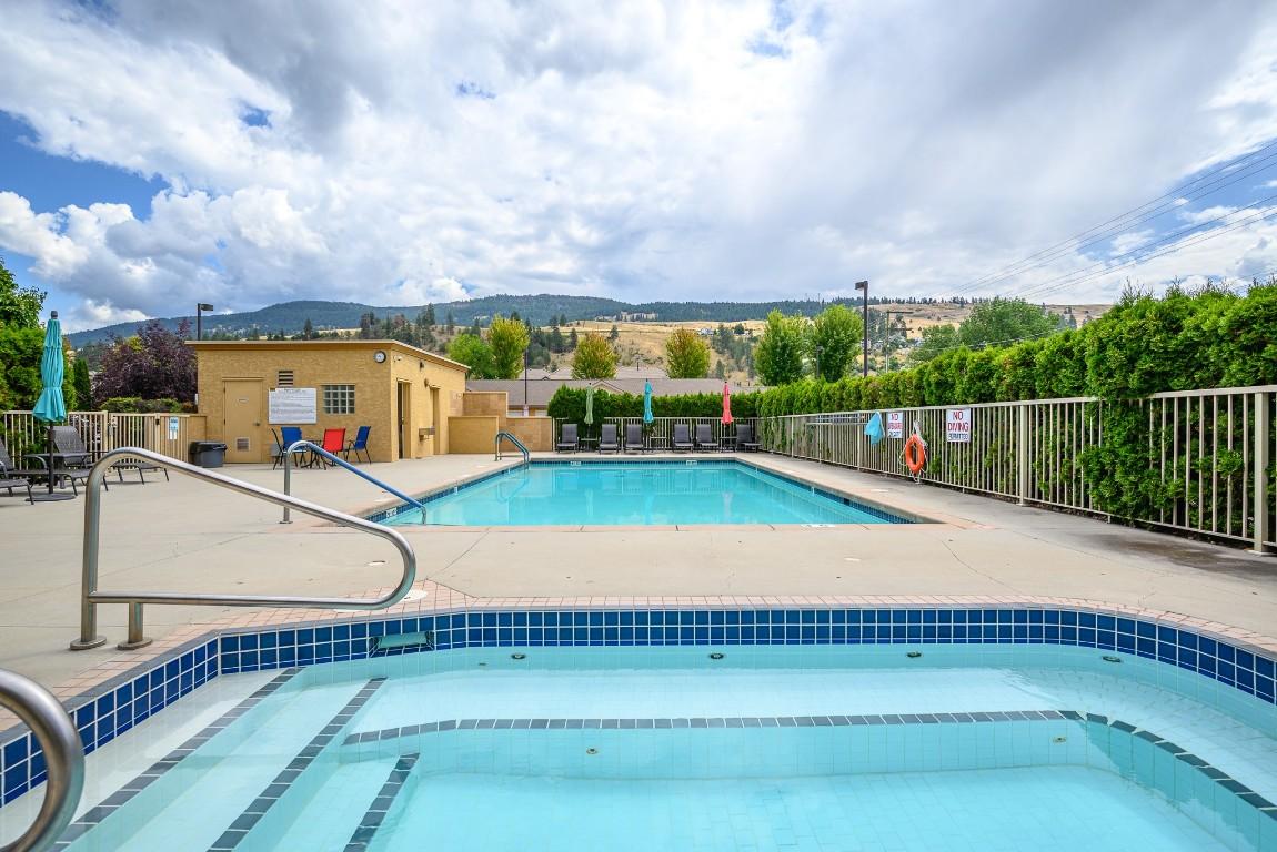 213-3550 Woodsdale Road, Lake Country, BC - Outdoor With In Ground Pool With Backyard