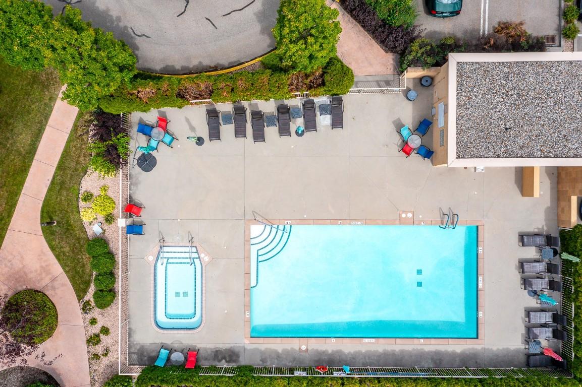 213-3550 Woodsdale Road, Lake Country, BC - Outdoor With In Ground Pool