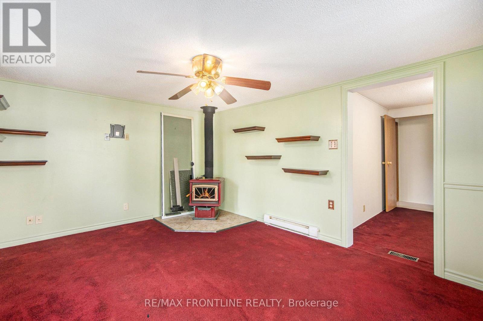 313 Acacia Road, Drummond/North Elmsley, ON - Indoor Photo Showing Other Room With Fireplace
