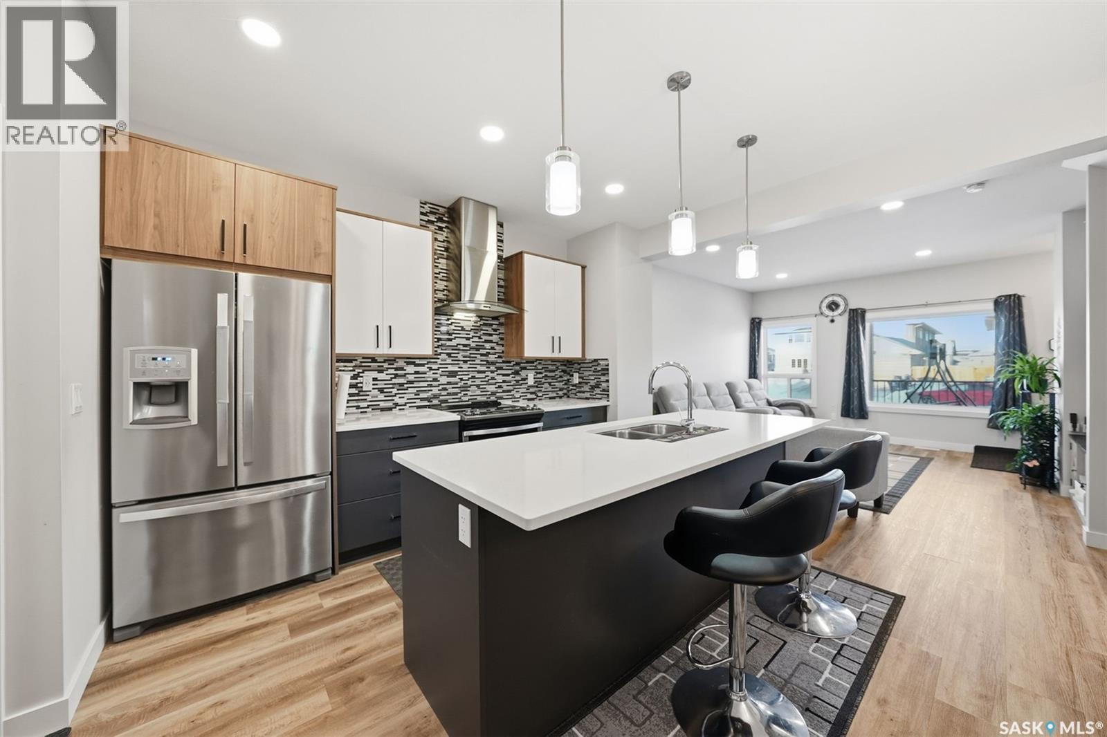 705 Evergreen Boulevard, Saskatoon, SK - Indoor Photo Showing Kitchen With Stainless Steel Kitchen With Double Sink With Upgraded Kitchen