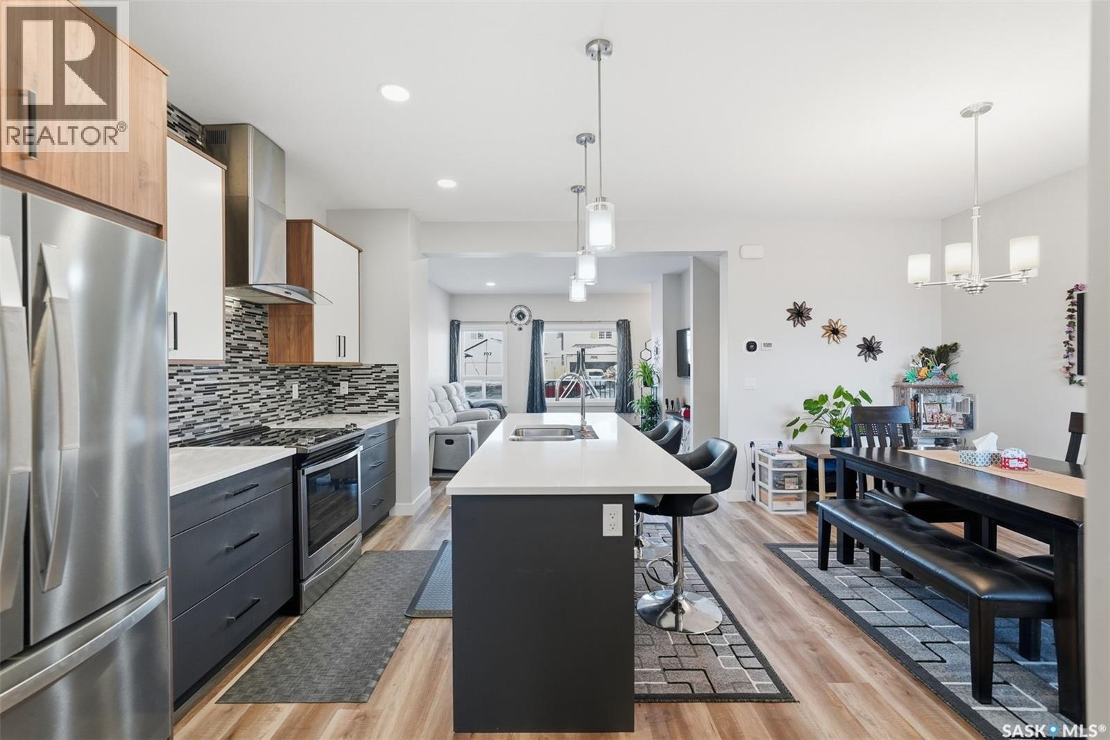 705 Evergreen Boulevard, Saskatoon, SK - Indoor Photo Showing Kitchen With Stainless Steel Kitchen With Double Sink With Upgraded Kitchen