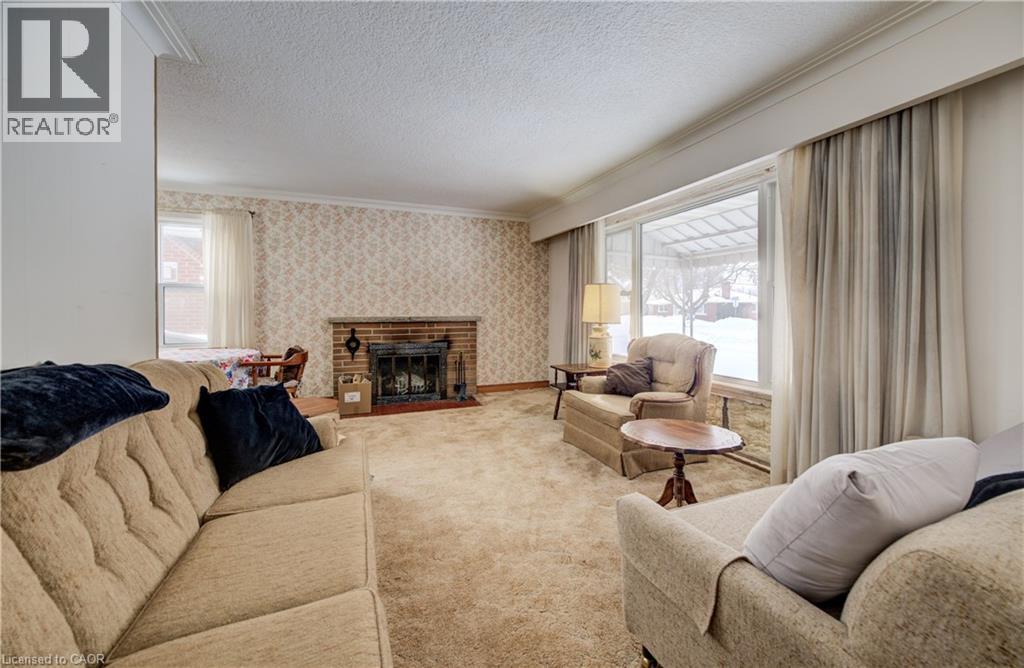 33 Elginfield Drive, Guelph, ON - Indoor Photo Showing Living Room With Fireplace
