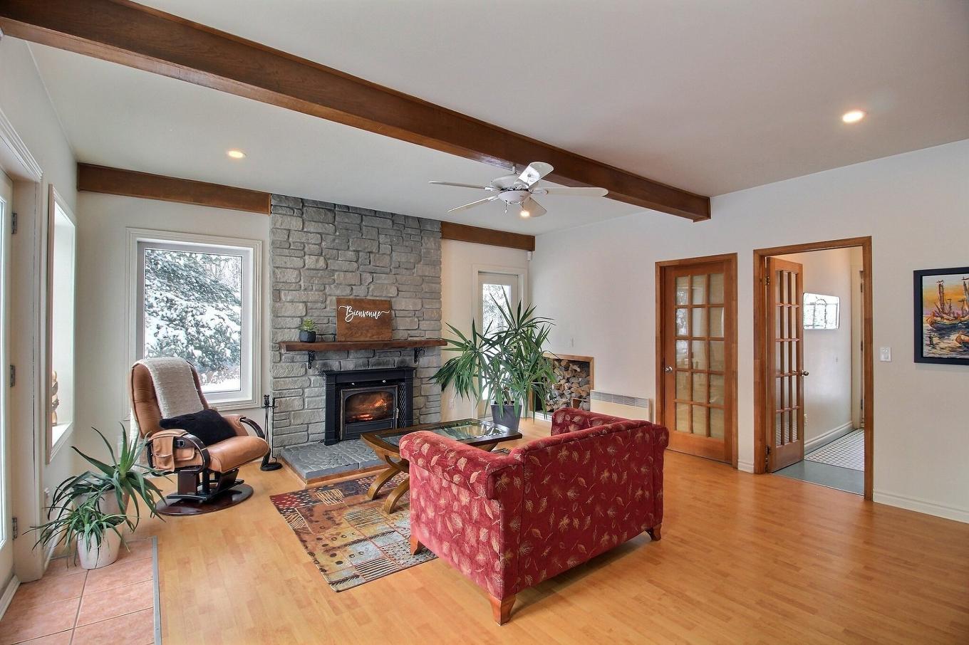 Salon - 157 Sent. Des Fougères, Val-D'Or, QC - Indoor Photo Showing Living Room With Fireplace