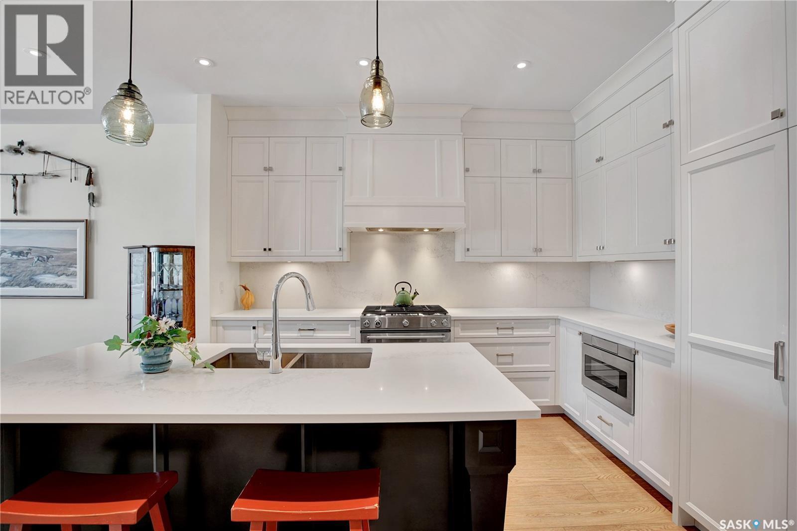 104 408 Cartwright Street, Saskatoon, SK - Indoor Photo Showing Kitchen With Double Sink With Upgraded Kitchen