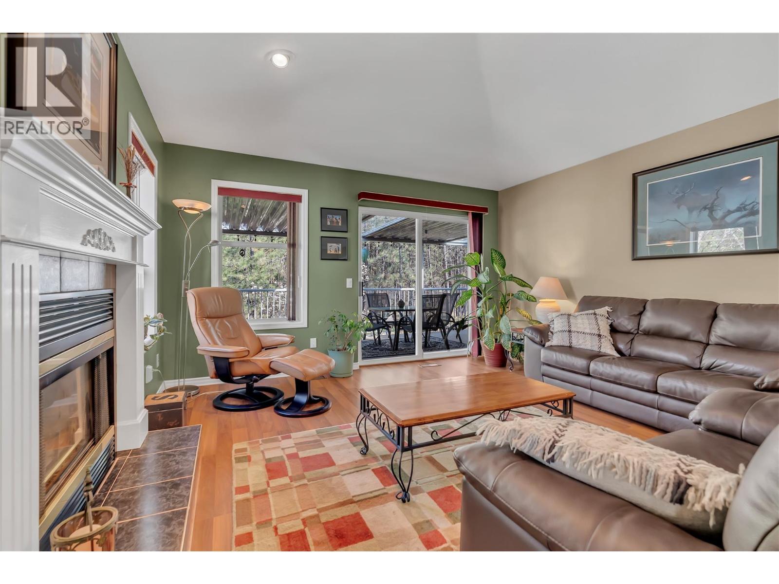 3008 Quail Crescent, Kelowna, BC - Indoor Photo Showing Living Room With Fireplace