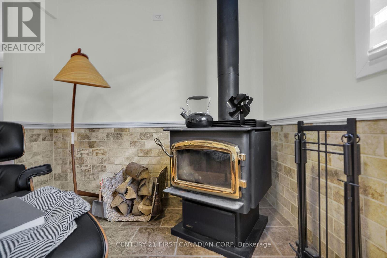 4279 South Routledge Road, London South (South V), ON - Indoor With Fireplace