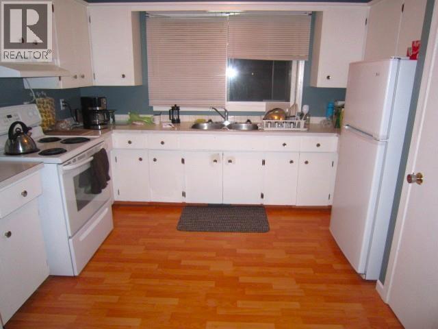 9714 9716 102 Avenue, Fort St. John, BC - Indoor Photo Showing Kitchen With Double Sink
