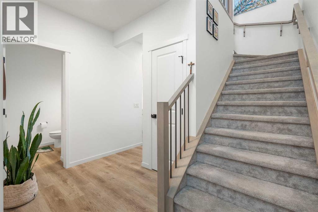 36 Magnolia Bay Se, Calgary, AB - Indoor Photo Showing Other Room