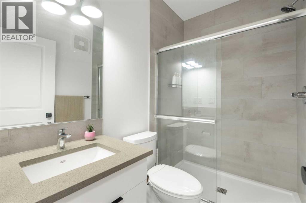 36 Magnolia Bay Se, Calgary, AB - Indoor Photo Showing Bathroom