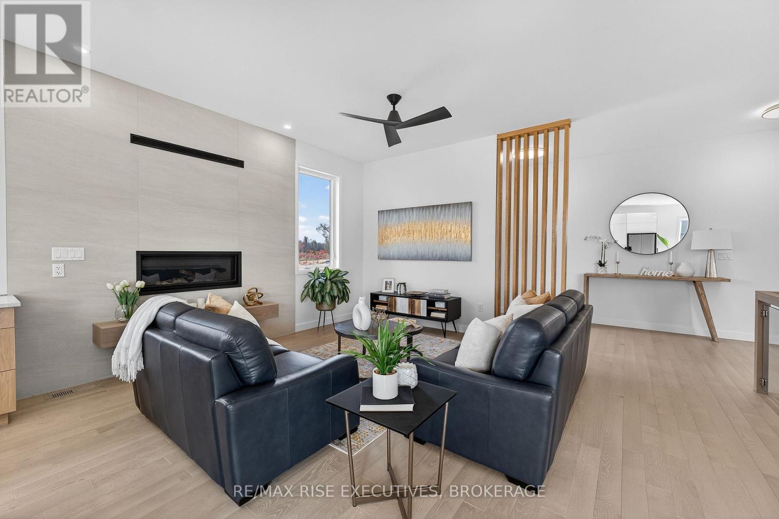 158 Summerside Drive, Frontenac (Frontenac South), ON - Indoor Photo Showing Living Room With Fireplace
