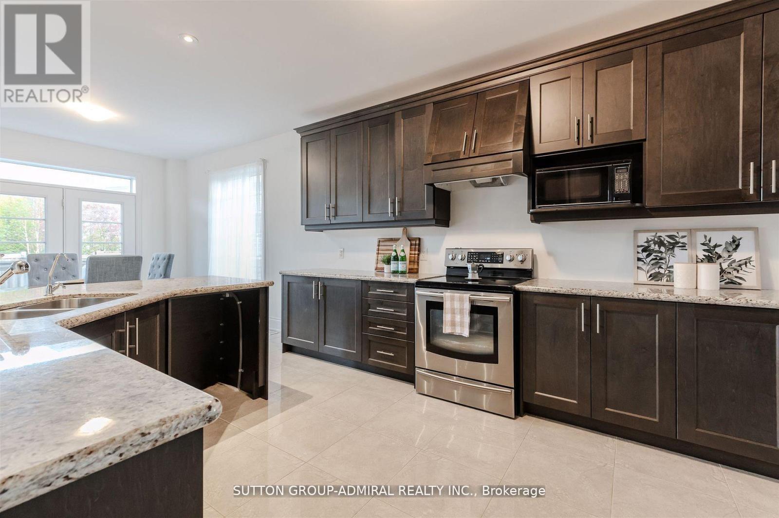 23 Samson Trail, King, ON - Indoor Photo Showing Kitchen With Double Sink