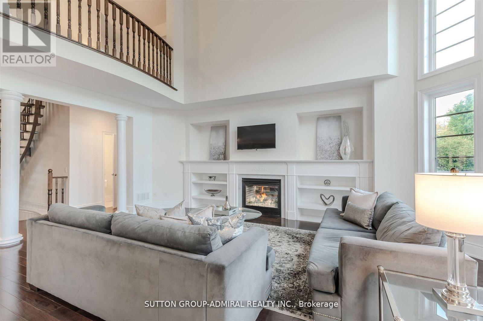 23 Samson Trail, King, ON - Indoor Photo Showing Living Room With Fireplace