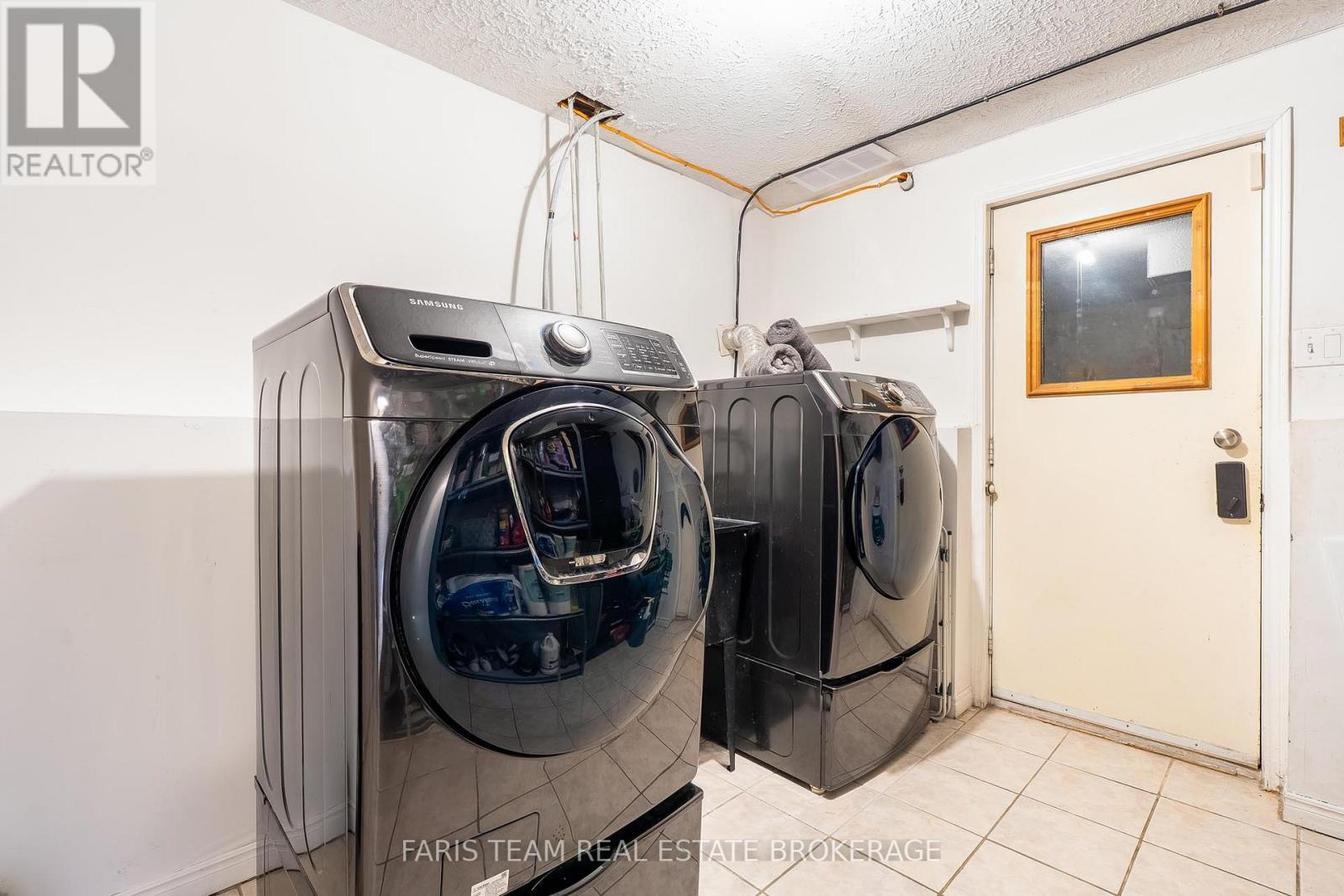 52 Roth Street, Essa, ON - Indoor Photo Showing Laundry Room