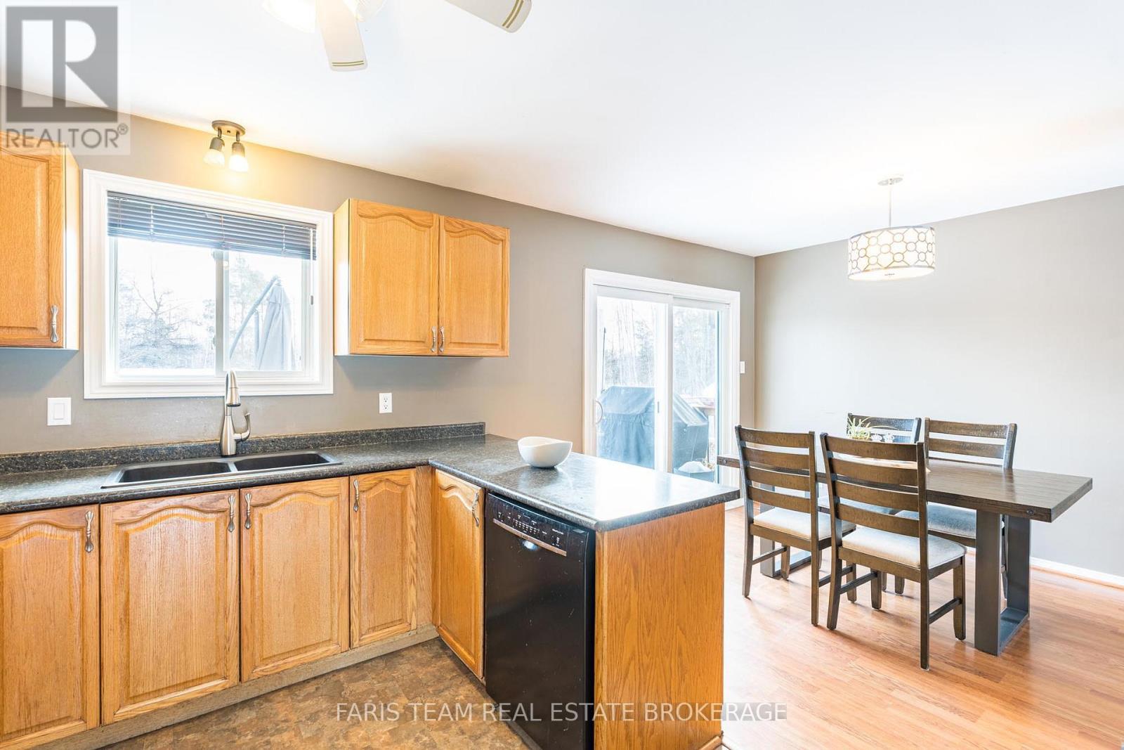 52 Roth Street, Essa, ON - Indoor Photo Showing Kitchen With Double Sink