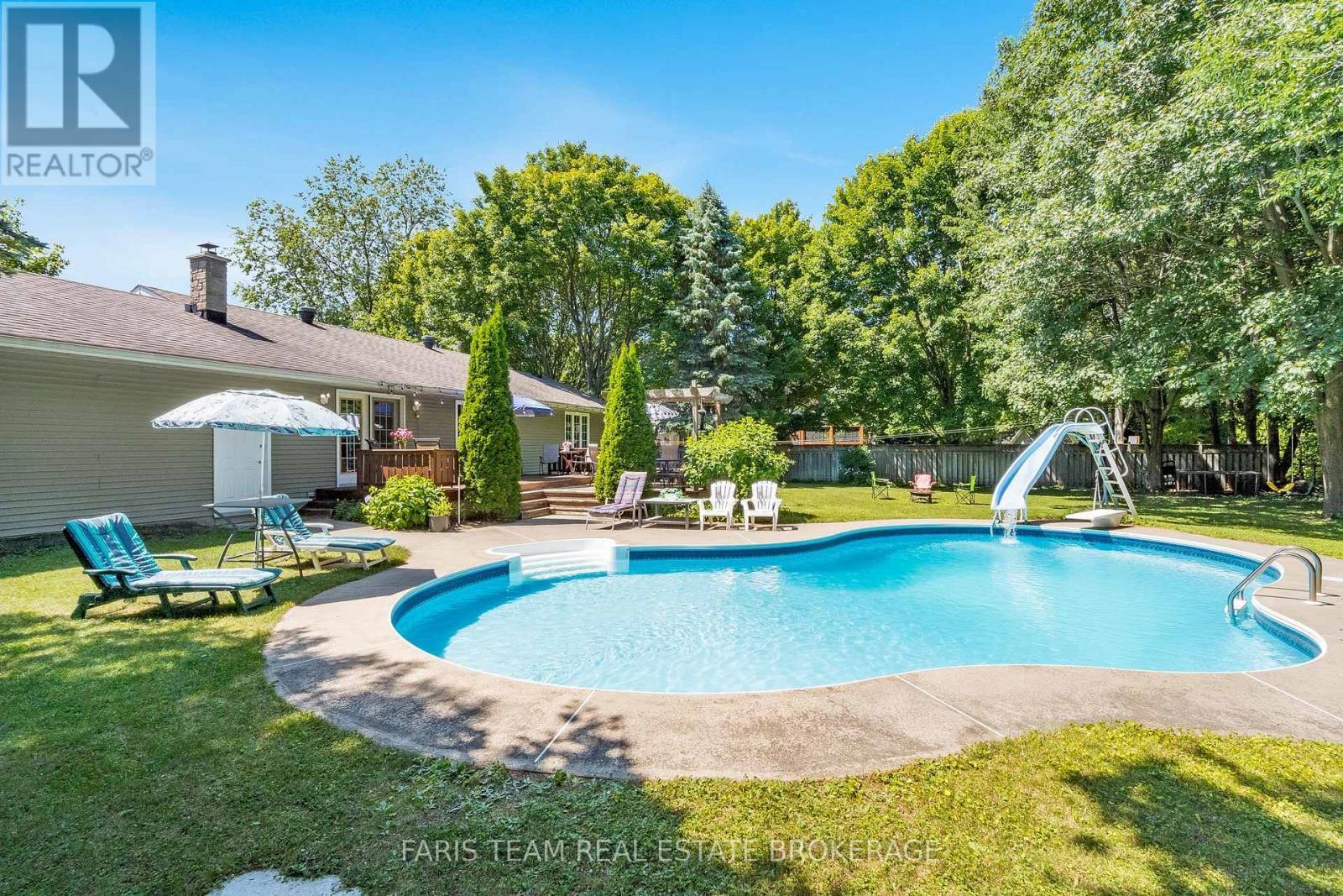 21 Maryjane Road, Tiny, ON - Outdoor With In Ground Pool With Deck Patio Veranda With Backyard