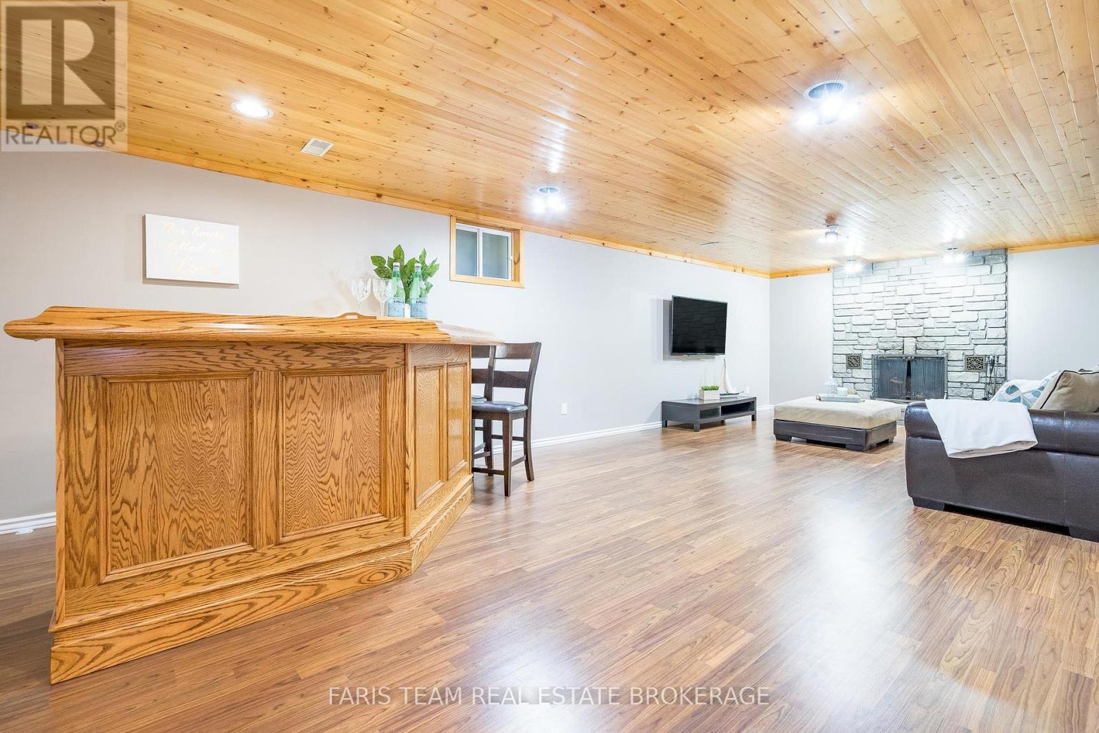 21 Maryjane Road, Tiny, ON - Indoor With Fireplace