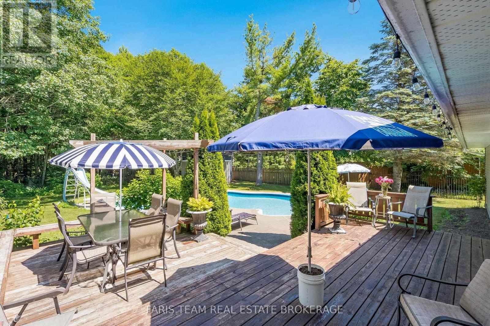 21 Maryjane Road, Tiny, ON - Outdoor With In Ground Pool With Deck Patio Veranda