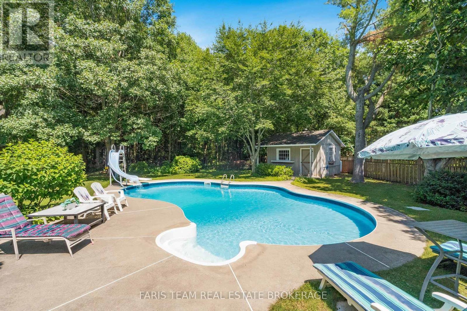 21 Maryjane Road, Tiny, ON - Outdoor With In Ground Pool With Backyard