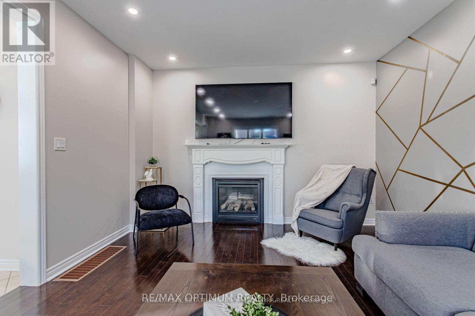 150 Lloyd Sanderson Drive, Brampton, ON - Indoor Photo Showing Living Room With Fireplace