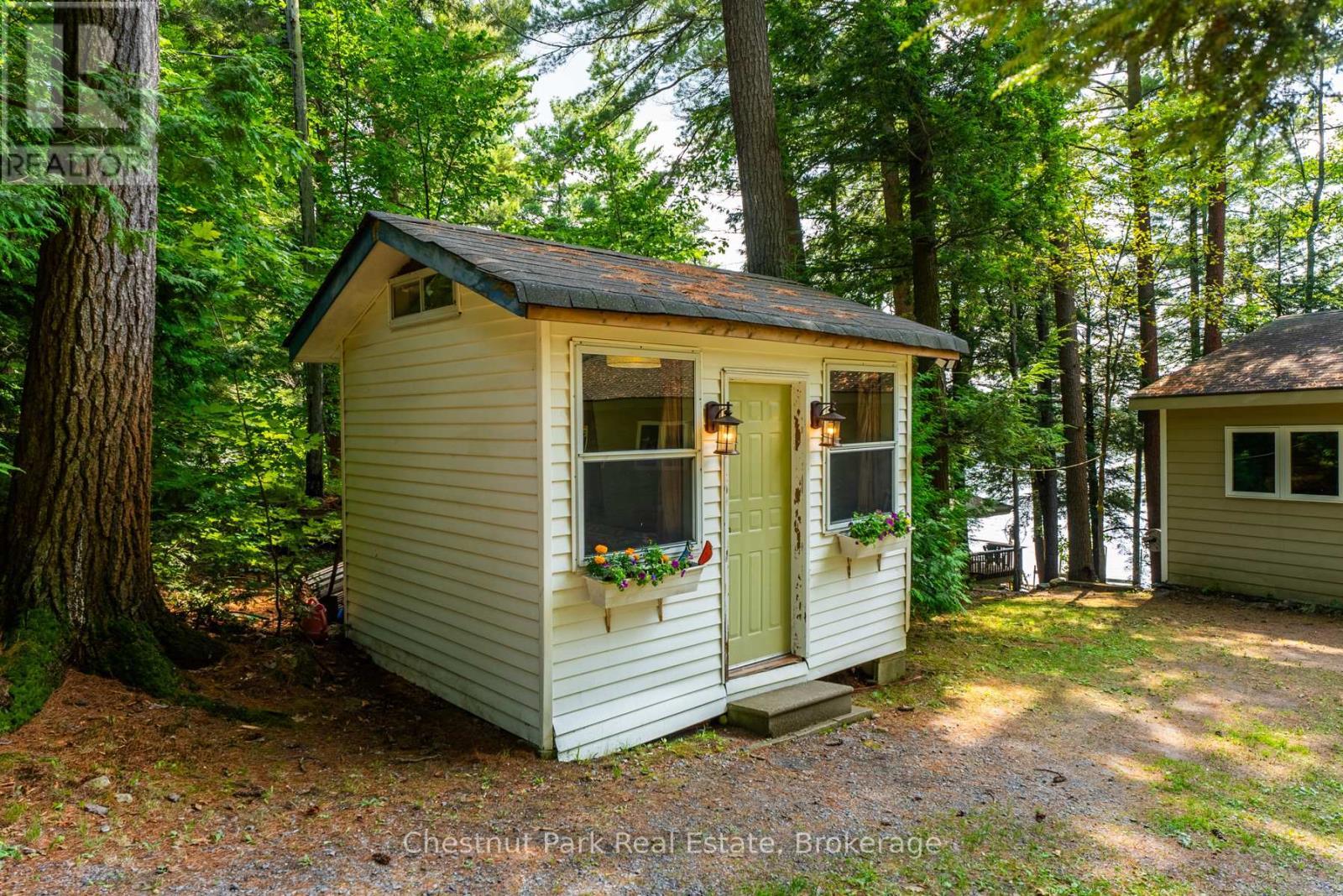 Unit #8 - 1111 Buckeye Road, Muskoka Lakes (Medora), ON - Outdoor With Exterior