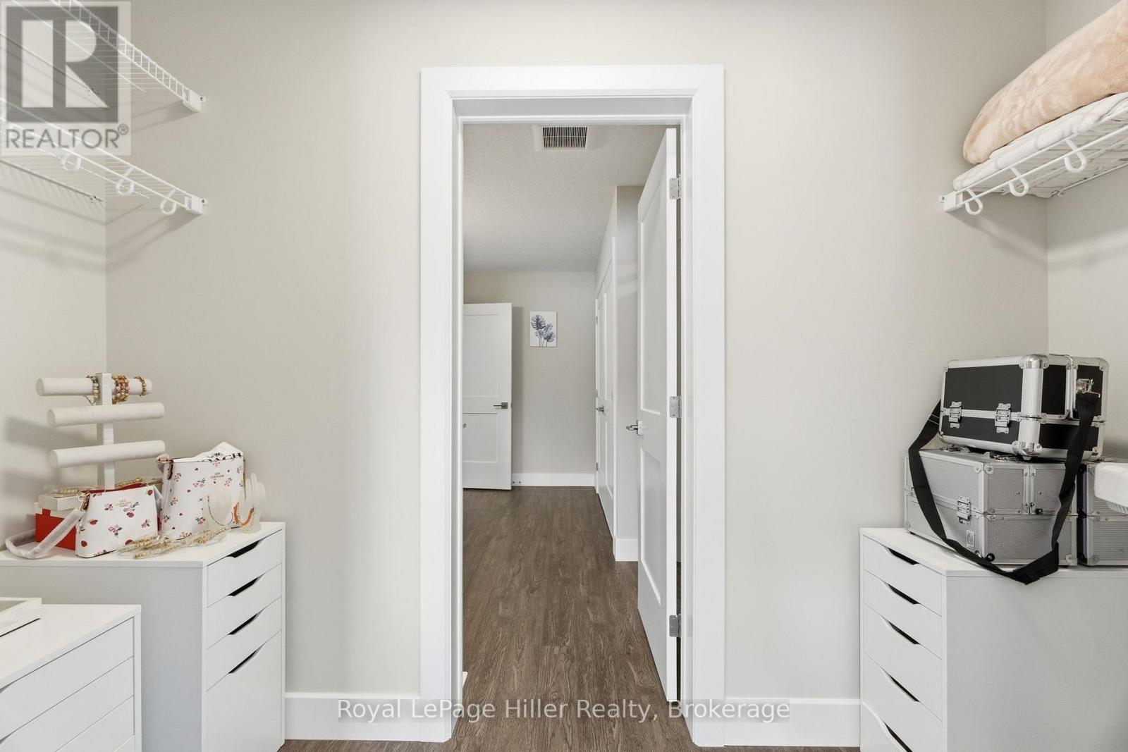 Walk Through Closet (Primary Bedroom) - 225A Thames Avenue, West Perth (Mitchell), ON - Indoor Photo Showing Laundry Room
