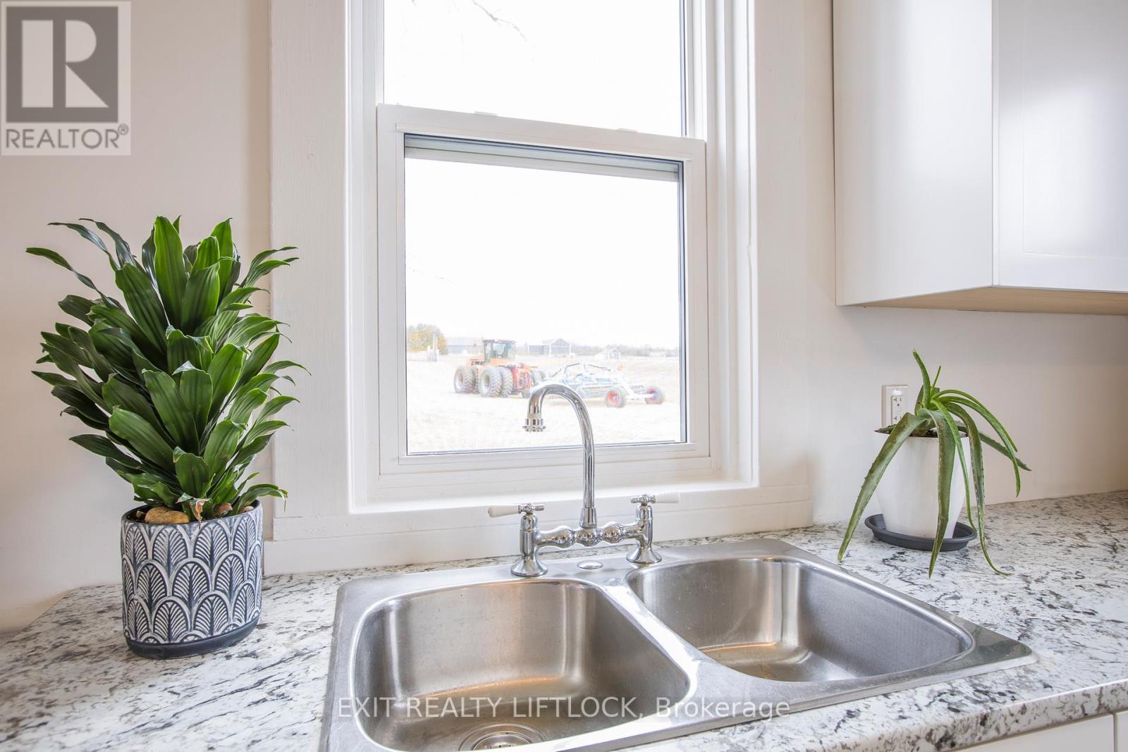 4922 Highway 7, Kawartha Lakes (Omemee), ON - Indoor Photo Showing Kitchen With Double Sink