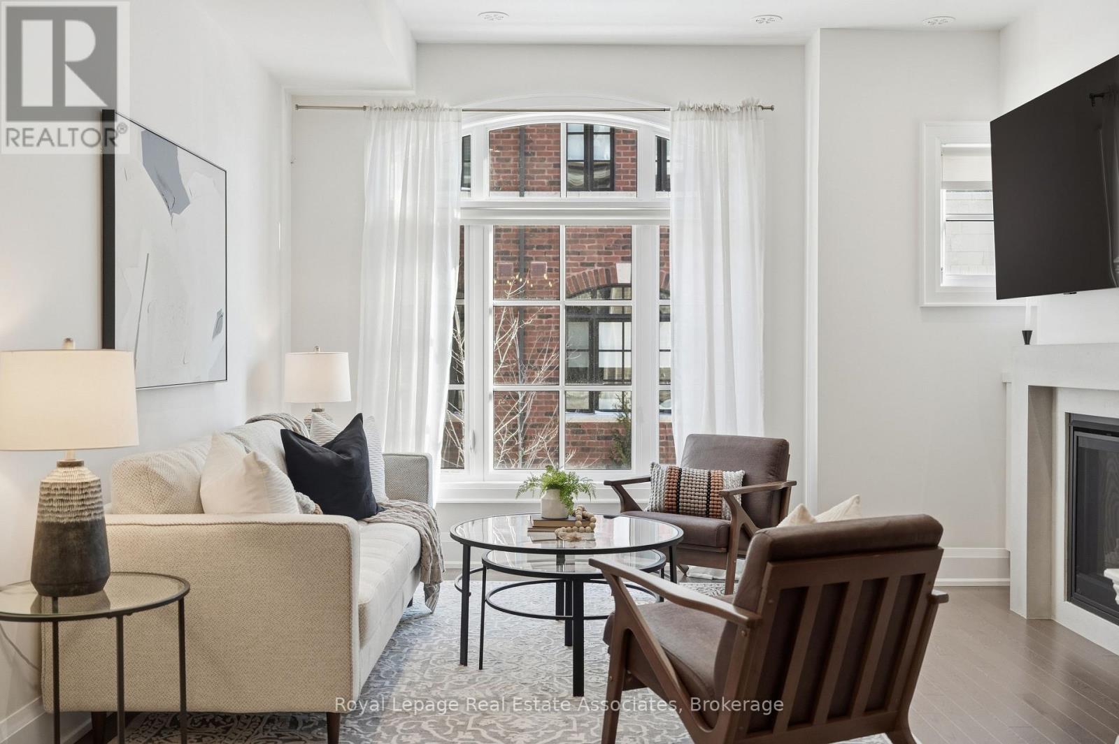 57 - 75 Elder Avenue, Toronto, ON - Indoor Photo Showing Living Room With Fireplace