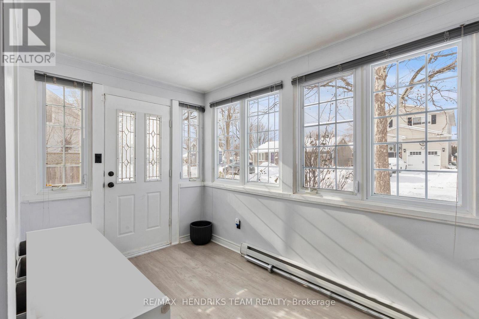 sunroom off front of house - 60 West Street N, Thorold (Thorold Downtown), ON - Indoor Photo Showing Other Room