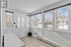 sunroom off front of house -