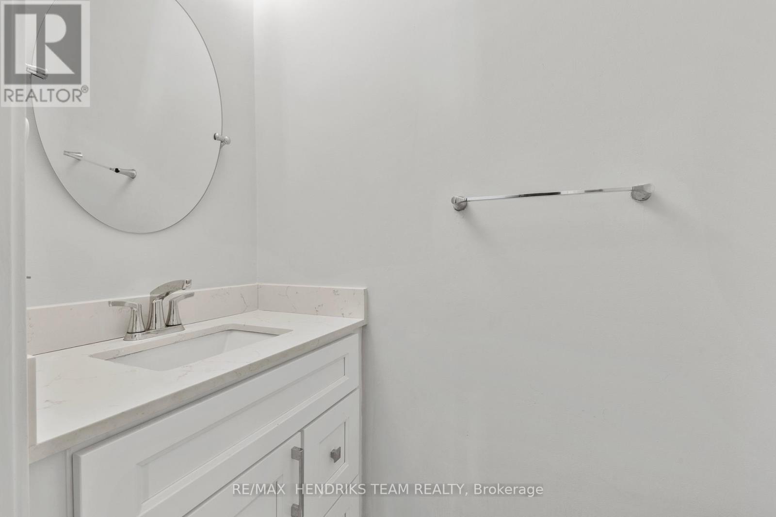 2 Piece bath in living room - 60 West Street N, Thorold (Thorold Downtown), ON - Indoor Photo Showing Bathroom