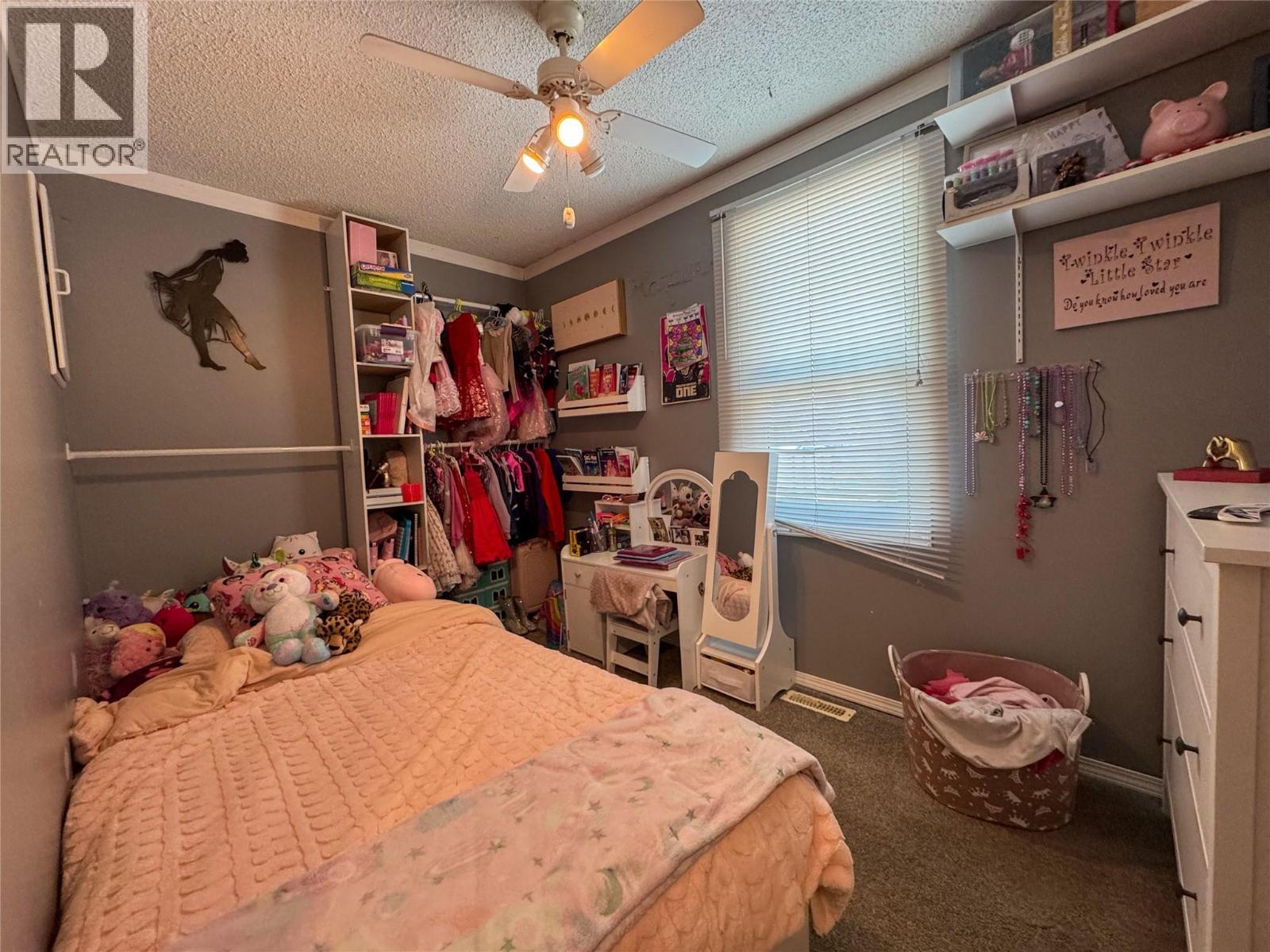 905 91 Avenue, Dawson Creek, BC - Indoor Photo Showing Bedroom
