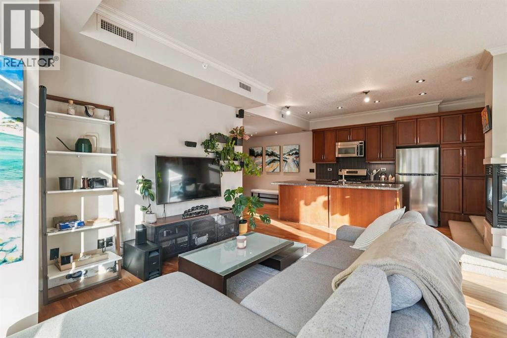 High ceilings and air conditioning - 306, 660 Eau Claire Avenue Sw, Calgary, AB - Indoor