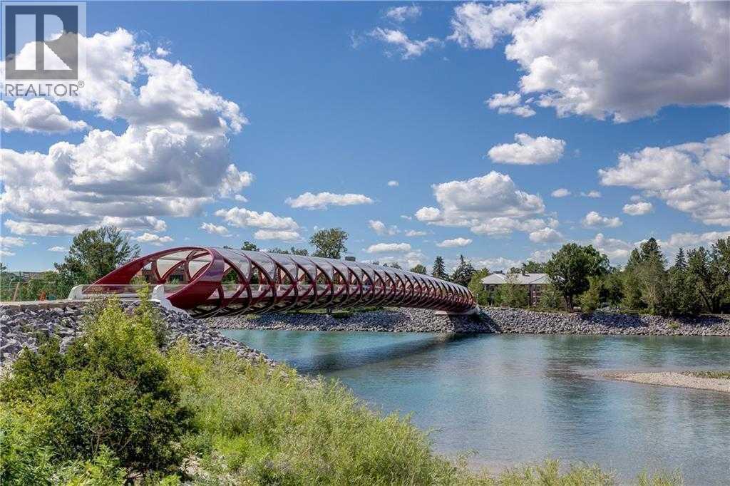 Close to Peace Bridge and Kensington Shops - 306, 660 Eau Claire Avenue Sw, Calgary, AB - Outdoor With Body Of Water With View