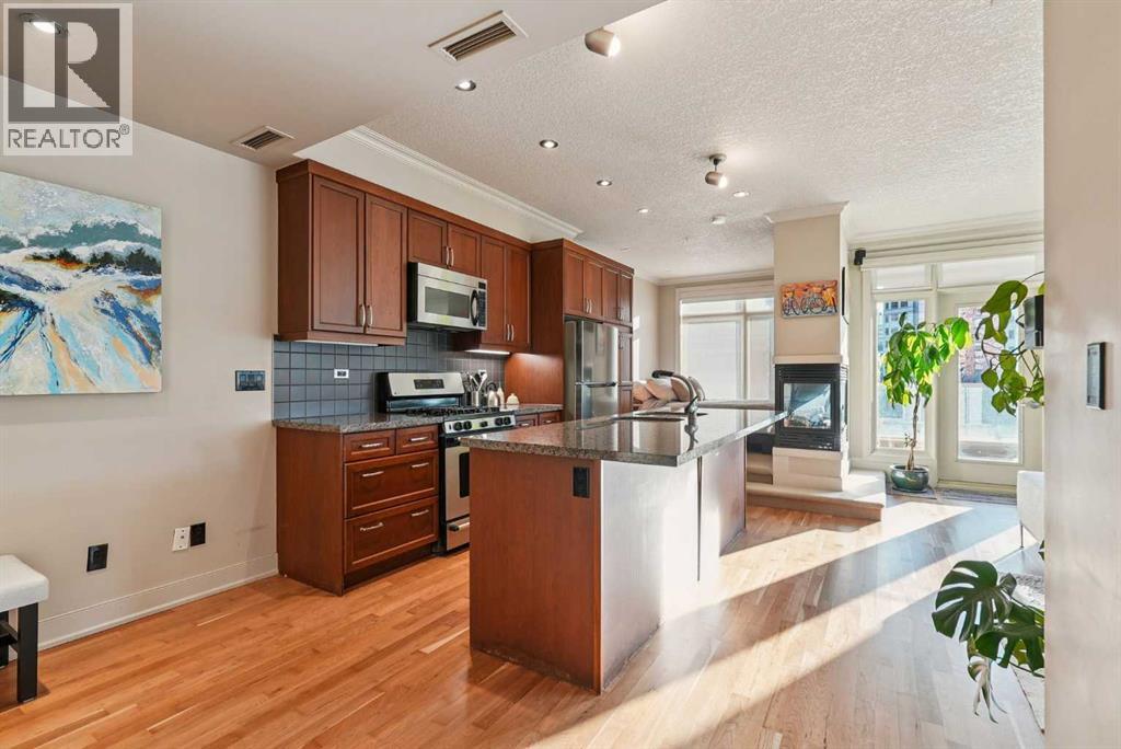 Gorgeous open kitchen - 306, 660 Eau Claire Avenue Sw, Calgary, AB - Indoor Photo Showing Kitchen With Stainless Steel Kitchen