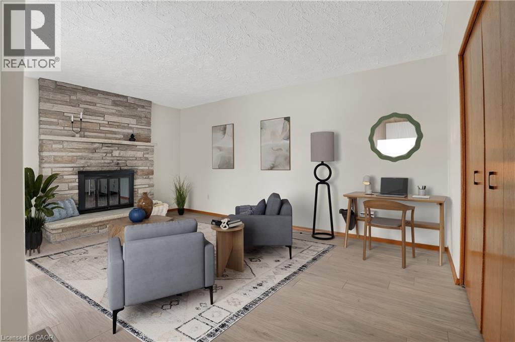 Virtually Staged - 384 Dunvegan Drive, Waterloo, ON - Indoor Photo Showing Other Room With Fireplace