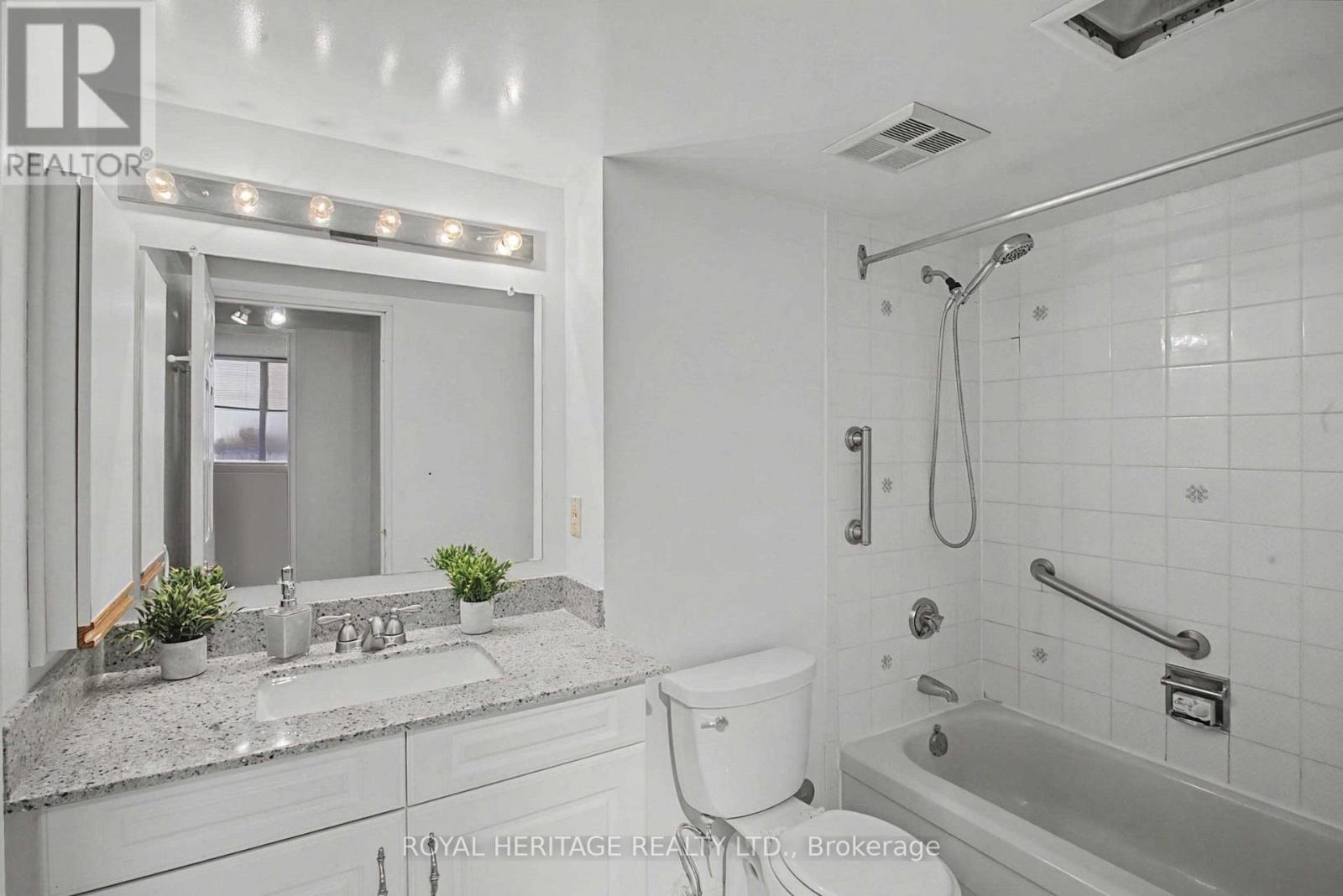 4pc w/rm -granite counter newer vanity & Toilet - 509 - 30 Thunder Grove, Toronto, ON - Indoor Photo Showing Bathroom