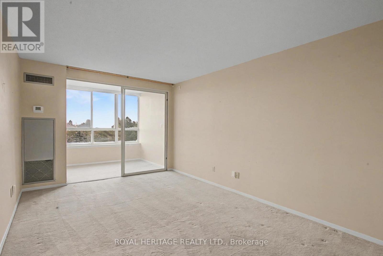 Living room walks out to sunny solarium - 509 - 30 Thunder Grove, Toronto, ON - Indoor Photo Showing Other Room