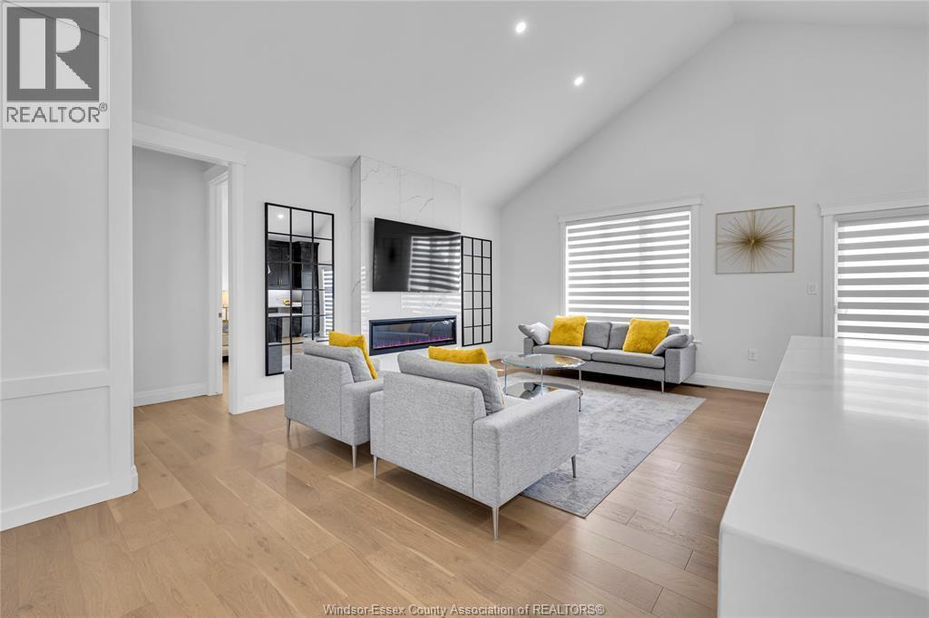 385 Matese Street, Lakeshore, ON - Indoor Photo Showing Living Room With Fireplace