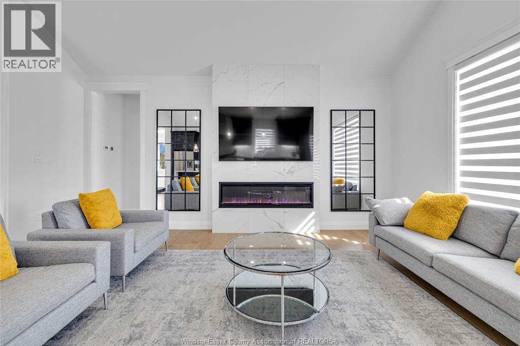 385 Matese Street, Lakeshore, ON - Indoor Photo Showing Living Room With Fireplace