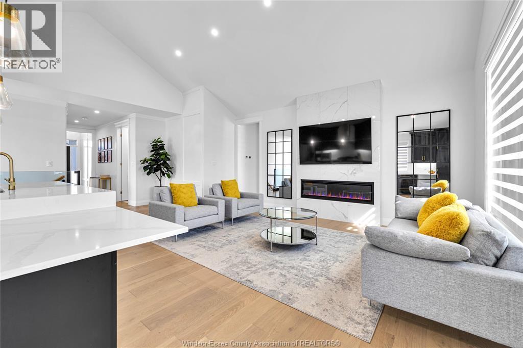385 Matese Street, Lakeshore, ON - Indoor Photo Showing Living Room With Fireplace