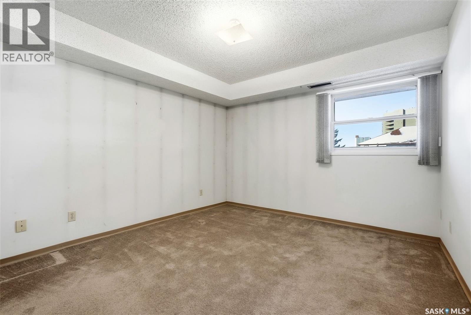 306 2237 Mcintyre Street, Regina, SK - Indoor Photo Showing Other Room