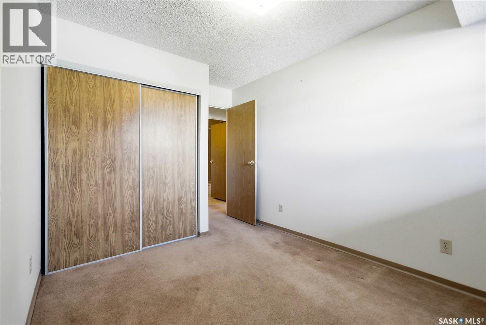 306 2237 Mcintyre Street, Regina, SK - Indoor Photo Showing Other Room