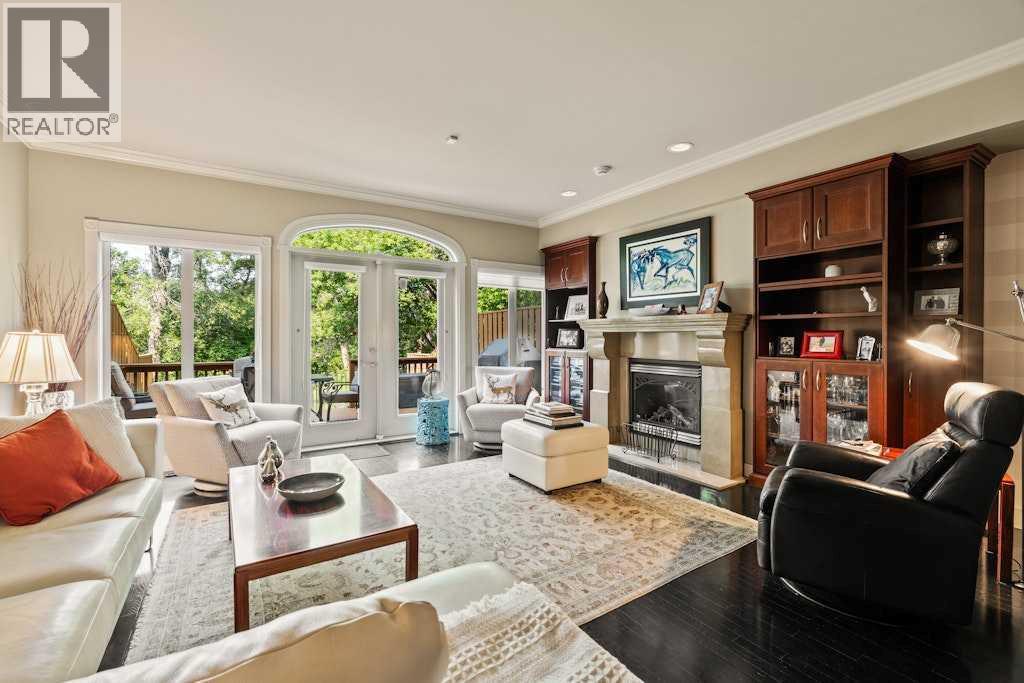 2421 Erlton Street Sw, Calgary, AB - Indoor Photo Showing Living Room With Fireplace