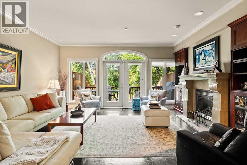 2421 Erlton Street Sw, Calgary, AB - Indoor Photo Showing Living Room With Fireplace