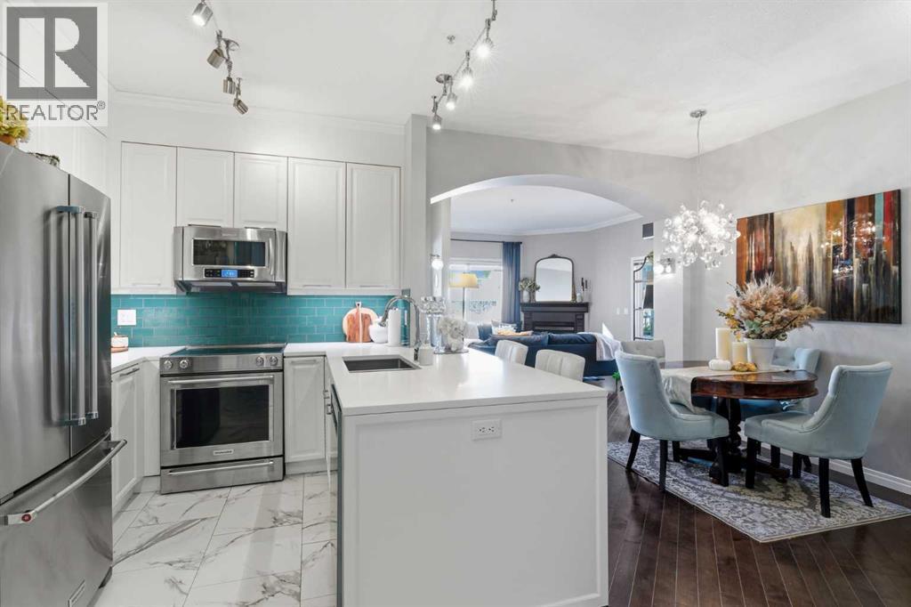 404, 881 15 Avenue Sw, Calgary, AB - Indoor Photo Showing Kitchen With Stainless Steel Kitchen With Upgraded Kitchen