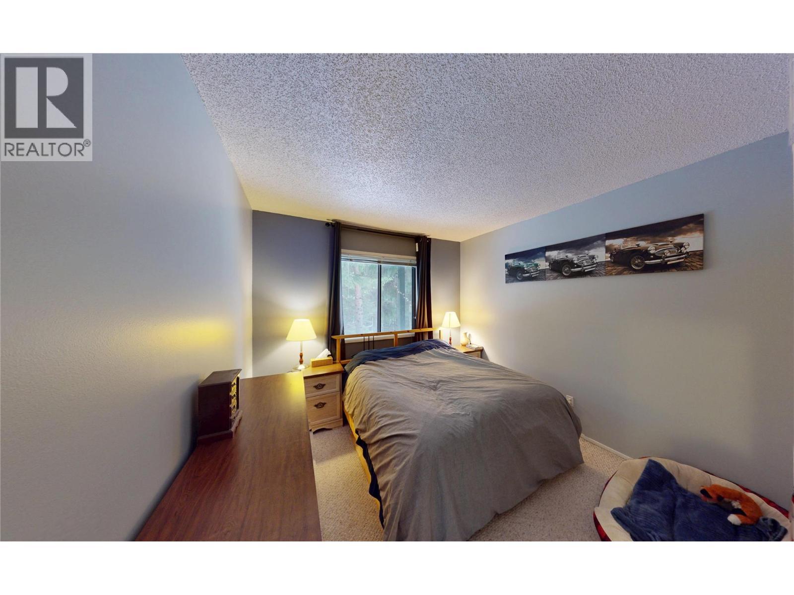 105A 1802 Alpine Drive, Elkford, BC - Indoor Photo Showing Bedroom