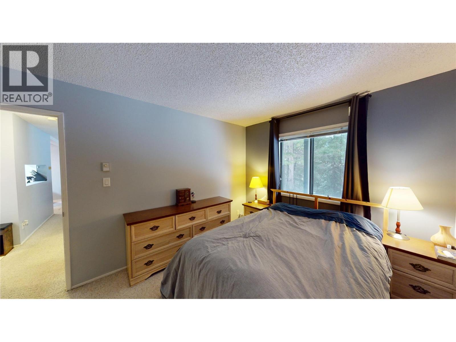 105A 1802 Alpine Drive, Elkford, BC - Indoor Photo Showing Bedroom