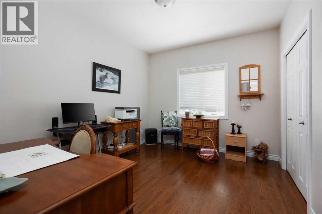 Spare room hardwood floor - 237 Trillium Road, Fort Mcmurray, AB - Indoor Photo Showing Office
